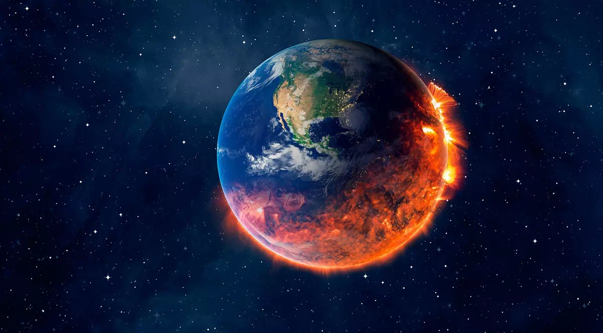 Imagine din sptațiu cu Planeta Pământ care arde jumătate.