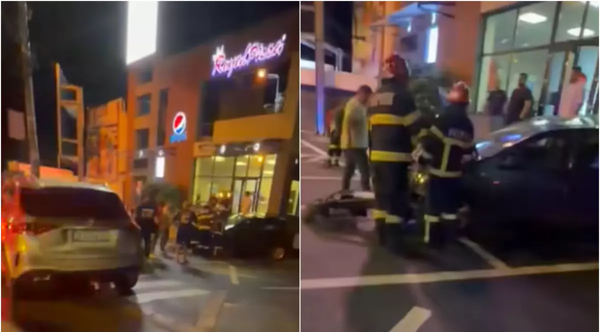 Imaginea surprinde intervenția echipajelor de urgență pe o stradă din oraș, în fața unei pizzerii, după un accident rutier petrecut pe timpul nopții. În zonă se observă mai multe autoturisme avariate, iar pompierii și polițiștii evaluează situația și acordă sprijin persoanelor i
