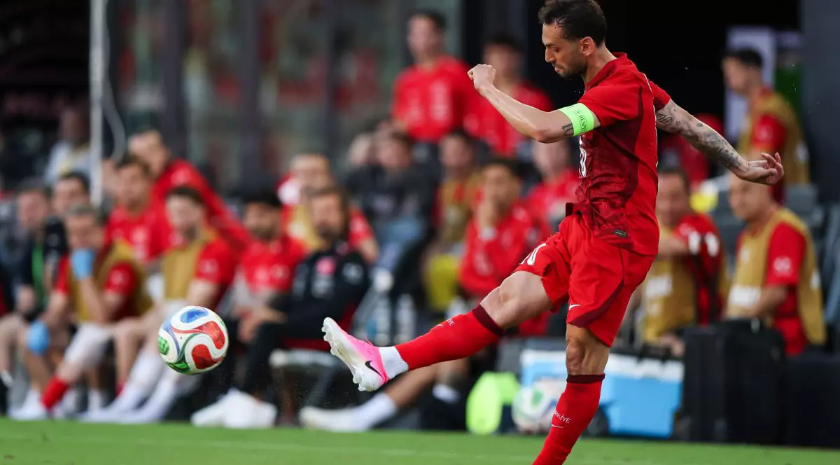 FORT LAUDERDALE, FLORIDA - JUNE 06: Hakan Çalhanoğlu #10 of Türkiye crosses the ball during the second half of the international friendly match between Turkey and Venezuela at Chase Stadium on June 06, 2026 in Fort Lauderdale, Florida. (Photo by Tomas Diniz Santos/Getty Images)