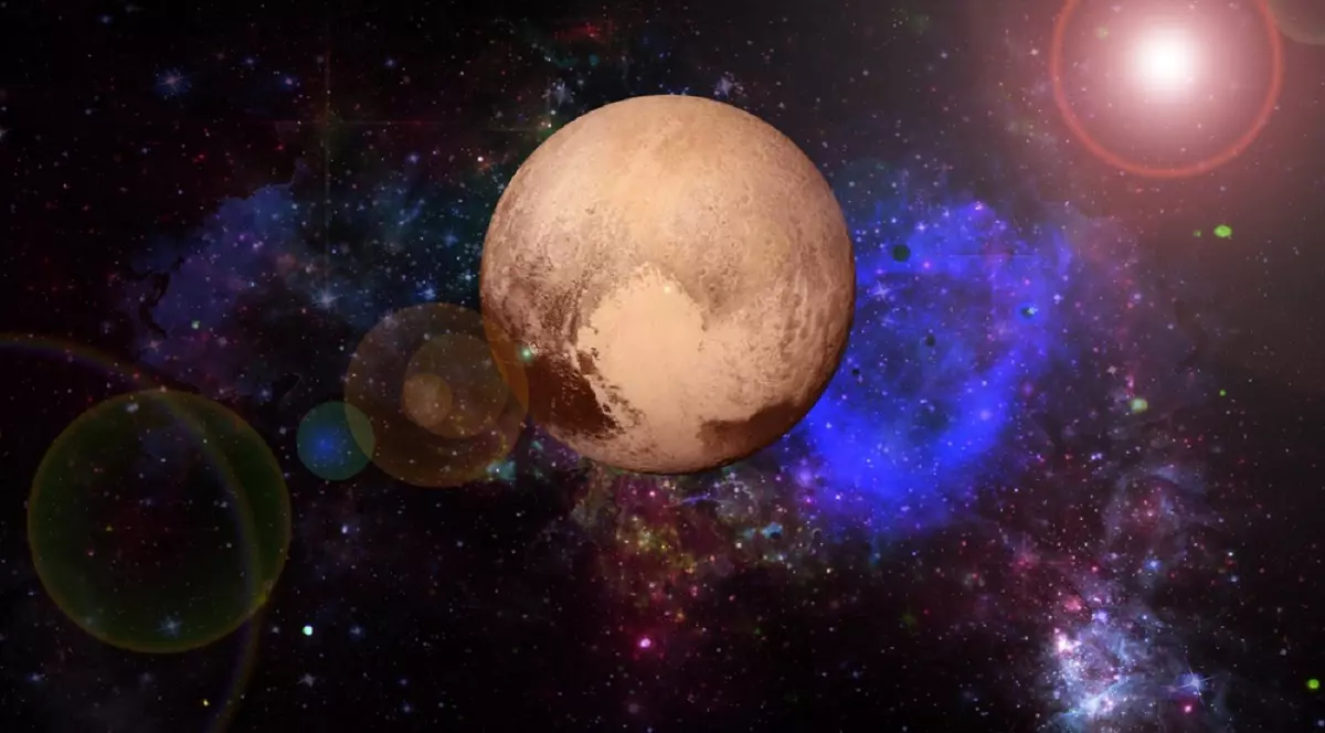 De ce nu mai este Pluto considerată o planetă - Planeta pitică Pluto în spațiu, pe fundal cu stele și o nebuloasă albastră Foto: Shutterstock.com