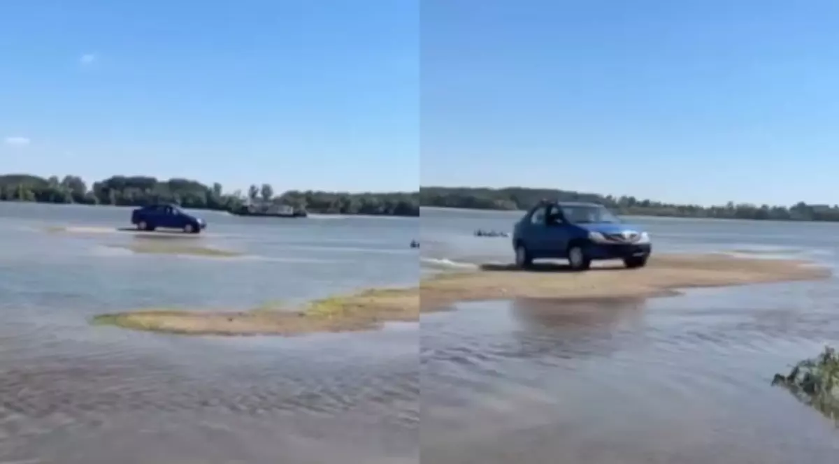 Un șofer a condus un Logan prin Dunărea secată. Sursă foto: Captură video Facebook/ Teleorman News.