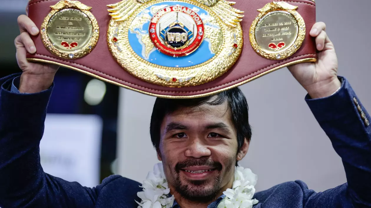 Boxerul filipinez Manny Pacquiao, cu centura de campion WBO. (FOTO: EPA)