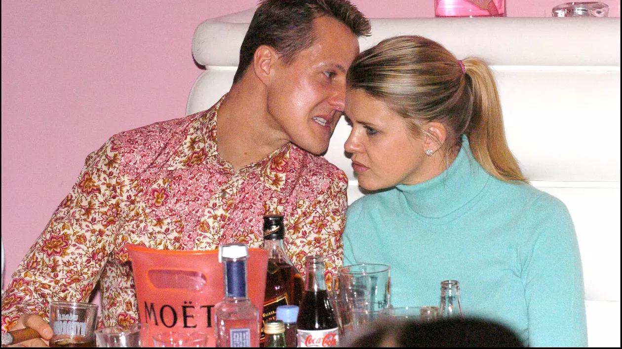 Cine va moșteni averea lui Michael Schumacher: Michael și Corinna, discutând în timpul unei petreceri