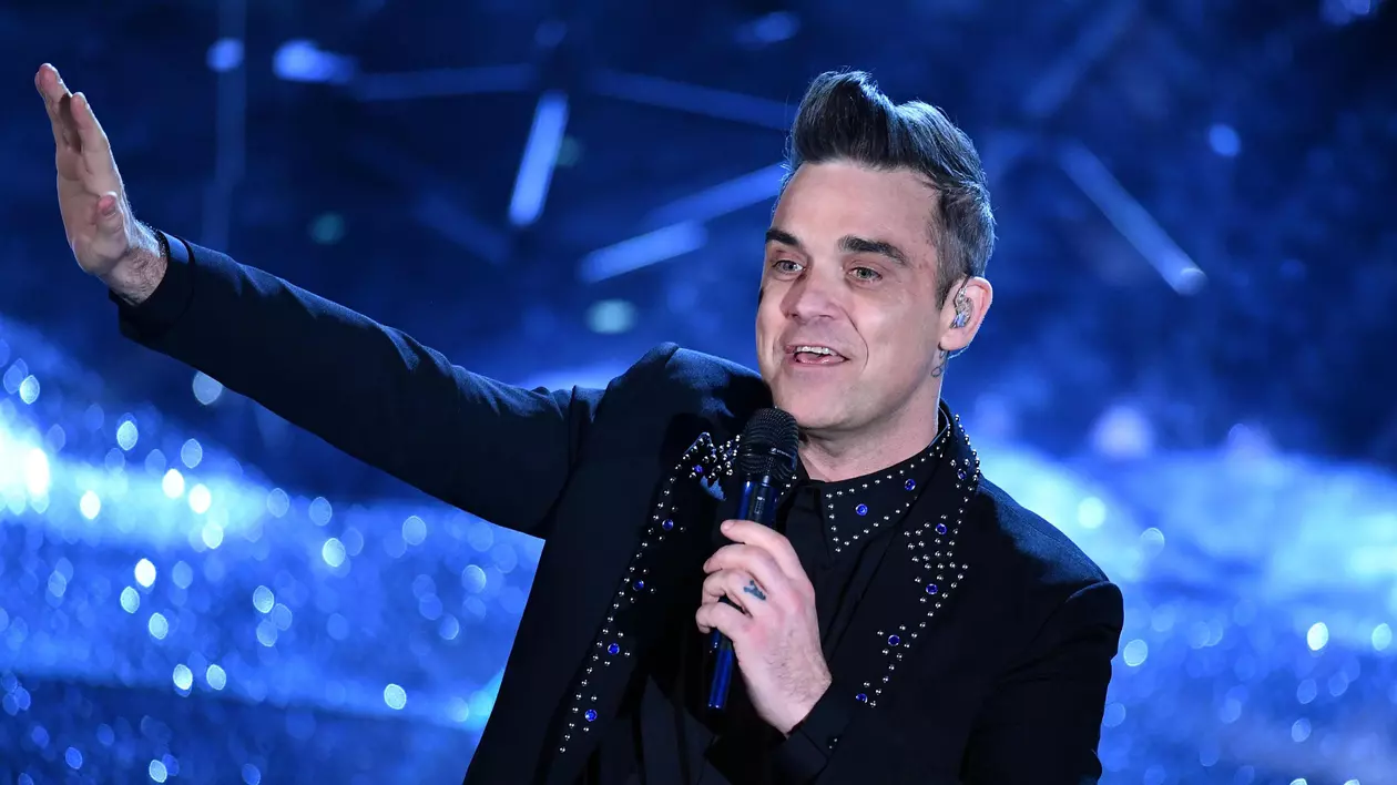 Robbie Williams ar putea suferi de sindromul Asperger. Robbie Williams, în timpul Festivalului de la Sanremo din 2017
