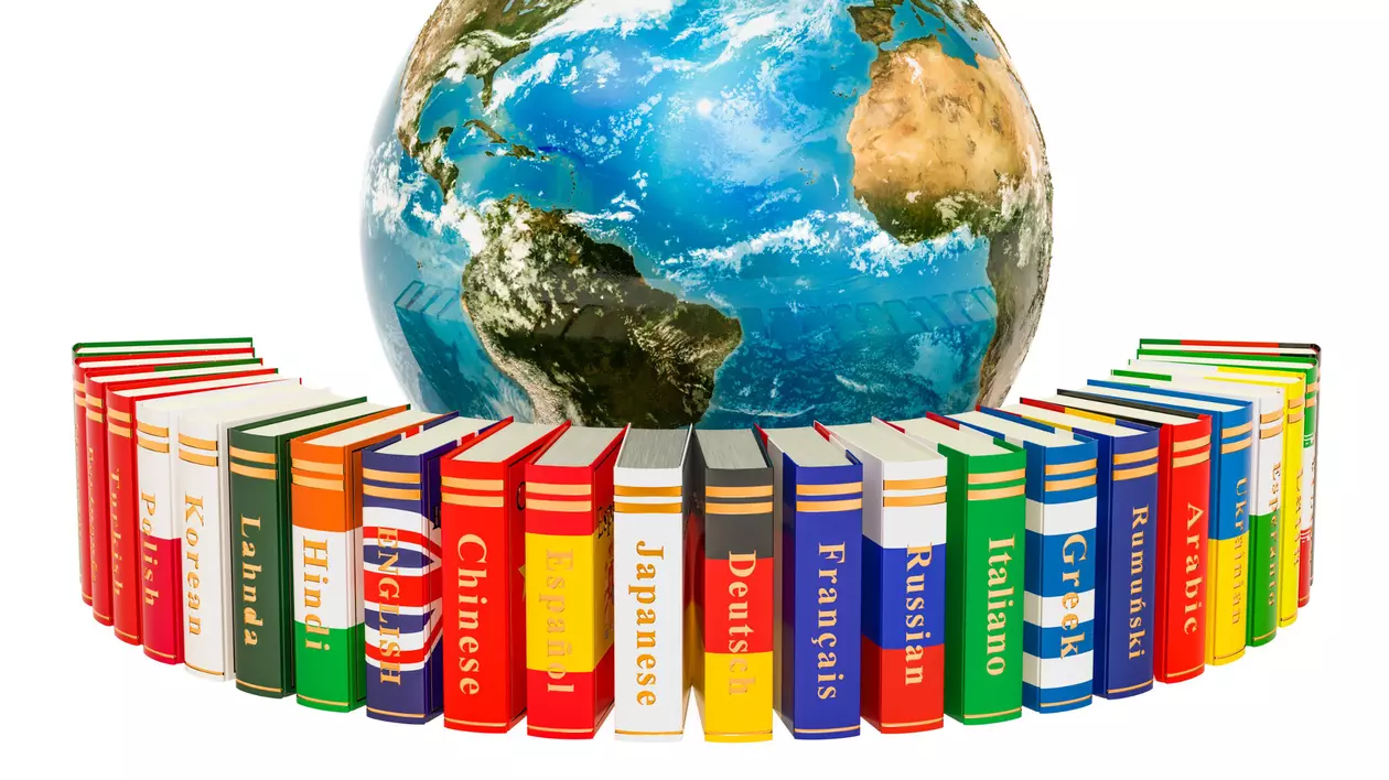 Care sunt cele mai vorbite limbi din lume - Imagine cu un glob pământesc înconjurat de cărţi care reprezintă limbile vorbite în lume
