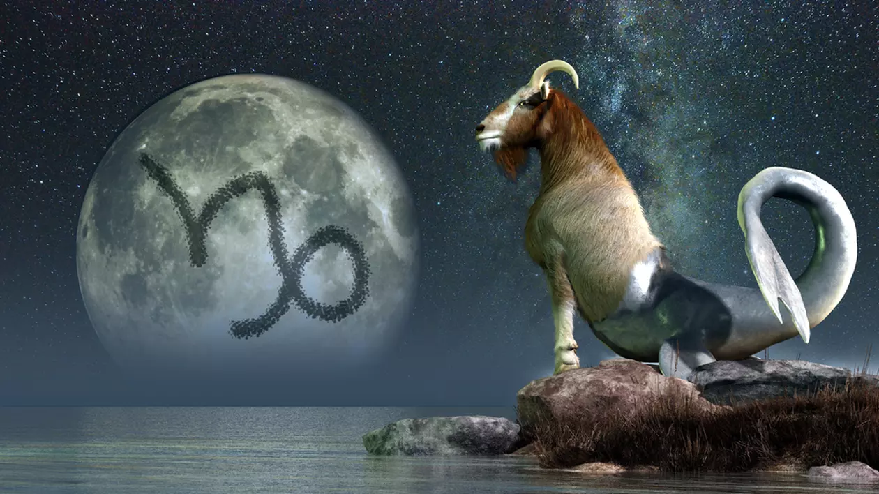 Horoscopul 2023 pentru zodia Capricorn - Iagine cu un decor nocturn format de luna ce are pe ea semnul zodiacal al capricornului, o întindere de apă şi o capră pe malul acesteia.