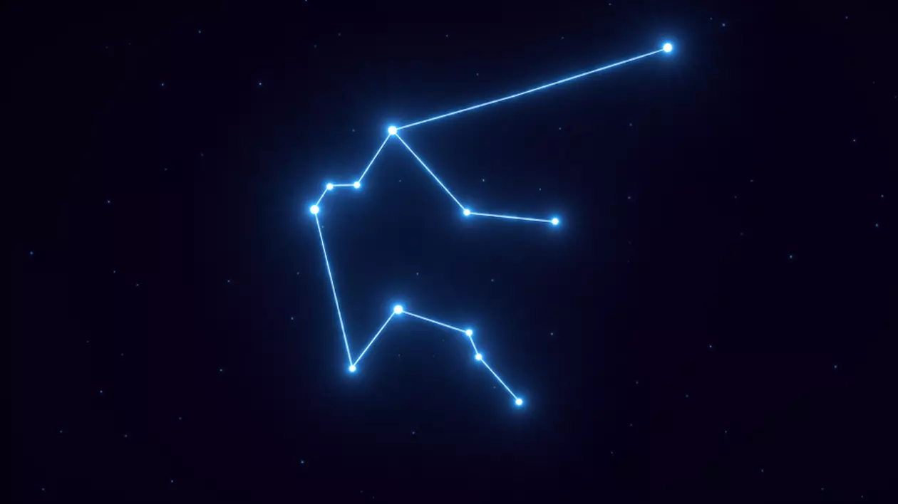 Zodia Vărsător în 2024. Anul cu cele mai bune alegeri - Imagine cu semnul zodiacal al Vărsătorului format din stele unite cu o linie strălucitoare, pe un fond negru.