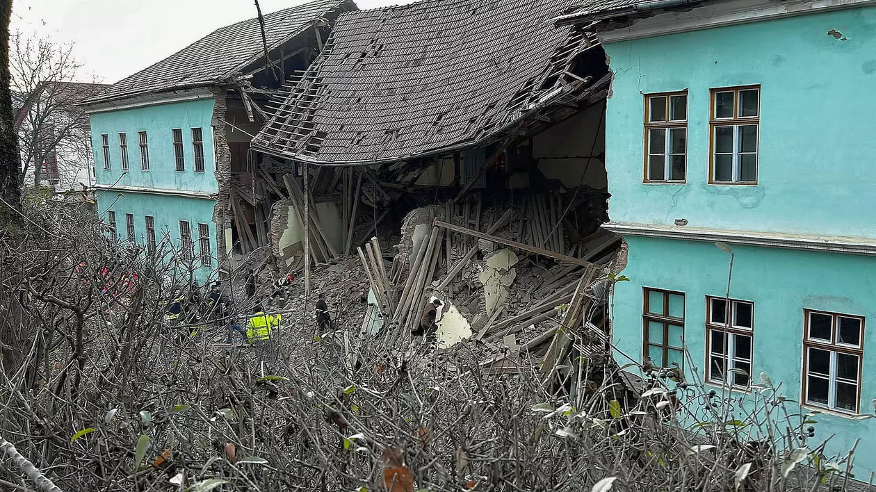 December 18, 2023, Odorheiul Secuiesc, Romania: Odorheiul Secuiesc (Romania), 18/12/2023.- A handout photo made available by the Romanian General Inspectorate for Emergency Situations (IGSU) shows rescue firefighters and volunteers searching for survivors among the rubbles of a building that served as a boarding school for a high school, which partially collapsed, in Odorheiul Secuiesc, Romania, 18 December 2023. Firefighters found under the debris of the building four students who were injured in the accident. Three of the children were saved and then hospitalized in the local hospital for medical care, but the fourth student could not be revived and was declared dead. The 'Tamas Aron' Theoretical High School and the boarding house buildings were built in 1910, having historical building status. Work was being carried out in the area to modernize the sewerage of the respective street. City Hall said that 97 students were accommodated in the building, but the authorities do not know exactly how many students were in the building at the time of its partial collapse. (RumanÃ­a) (Credit Image: © Igsu/EFE via ZUMA Press)