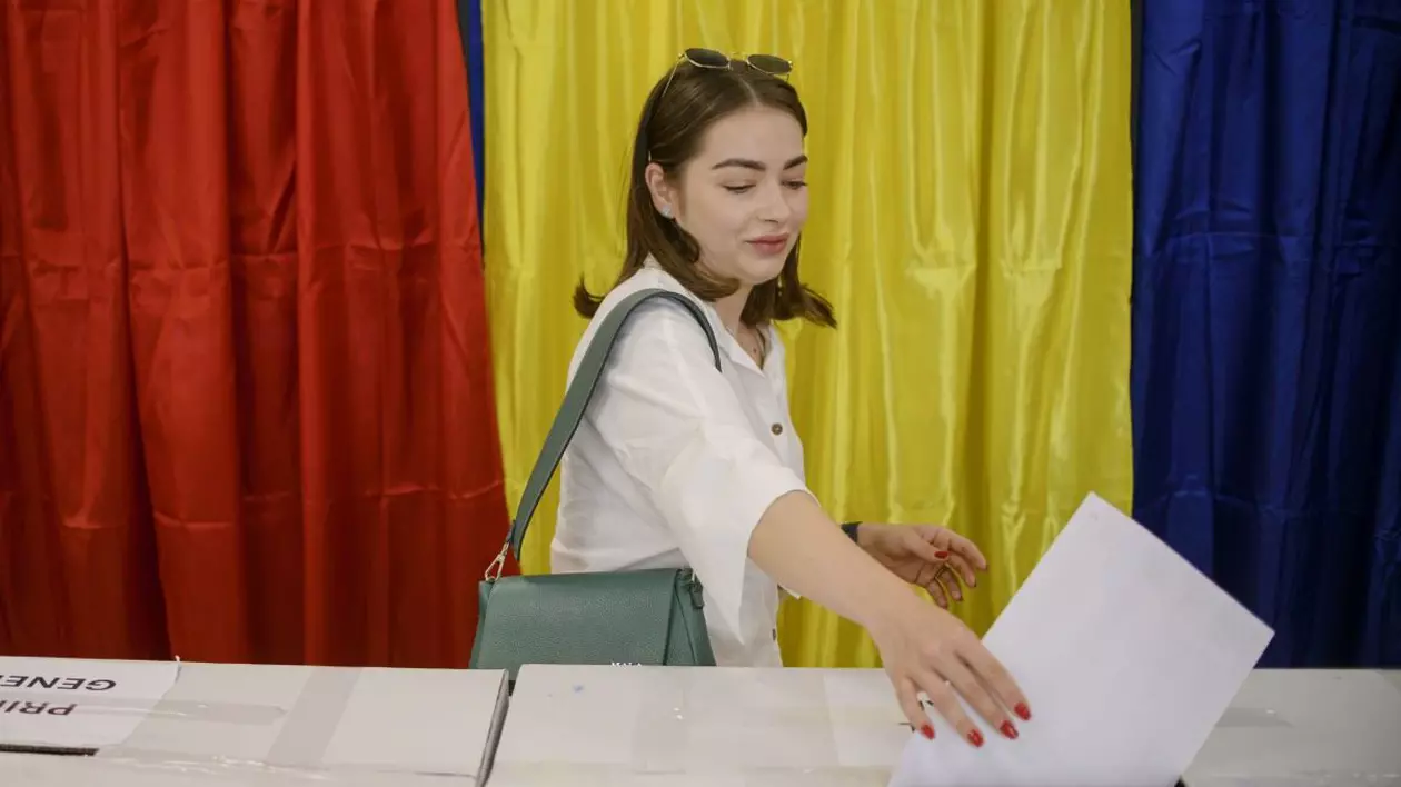 O româncă îți introduce votul în urnă