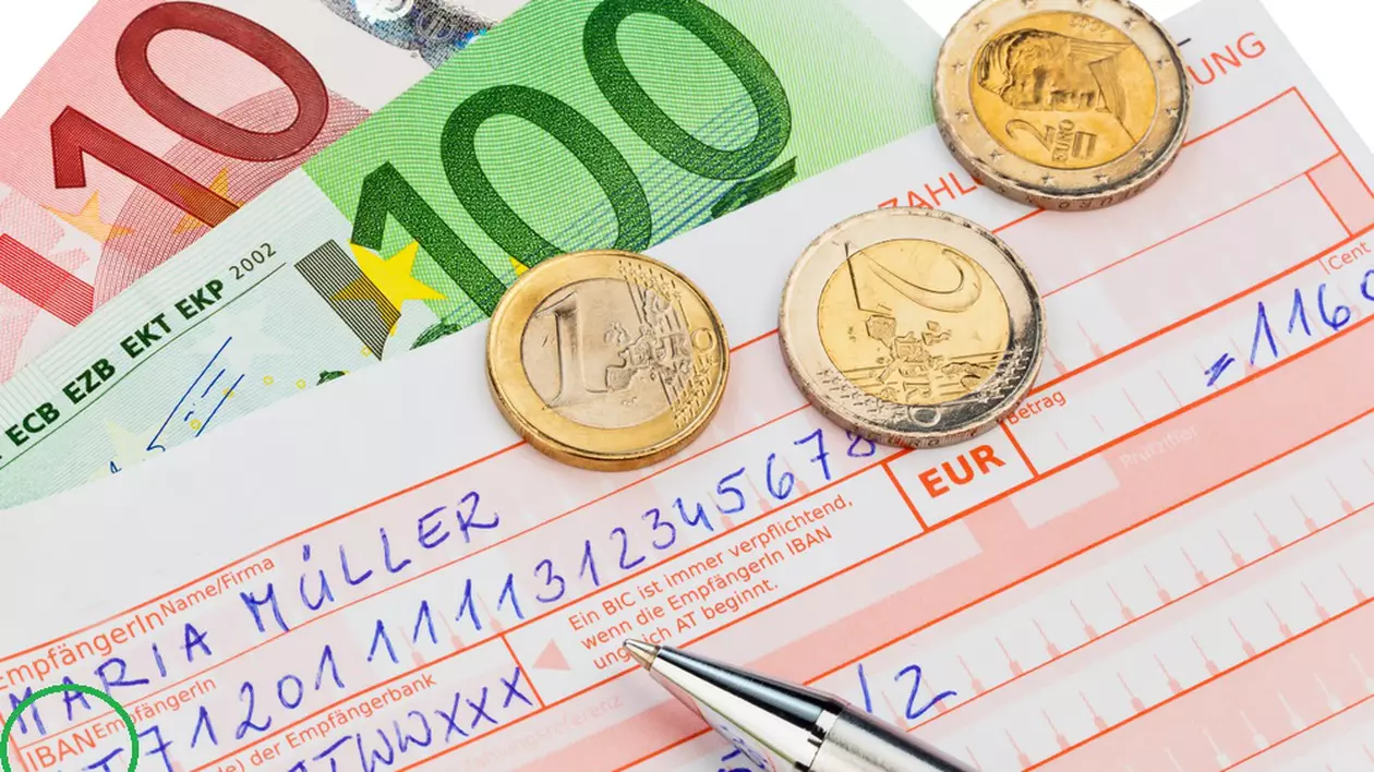 Ce este codul IBAN și unde îl găsești - Imagine cu un ordin de plată, bancnote şi monede euro.