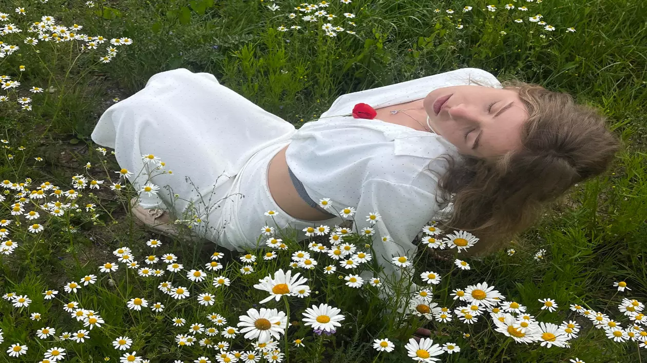 Femeia din Ucraina care a fost ucisă, îmbrăcată în alb