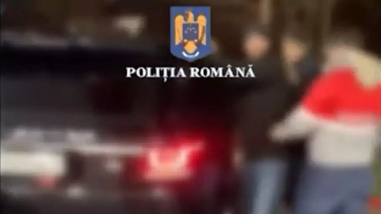 Justițiarul de Berceni, cu mâinile pe capota mașinii, în timp ce oamenii legii îl perchezționează