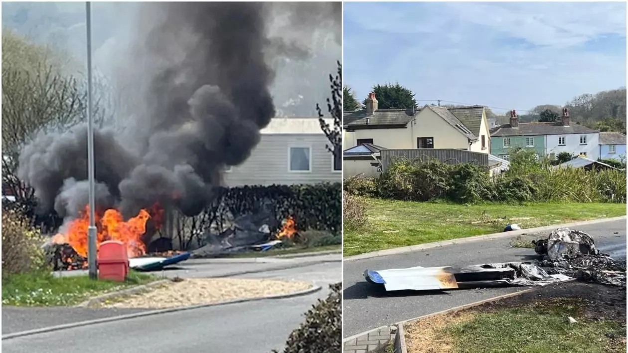 Doi oameni au ieșit singuri din avionul care s-a prăbușit și a luat foc pe o stradă dintr-un parc de vacanță din Marea Britanie. În imagini se vede un fum negru gros și aparatul căzut pe sol