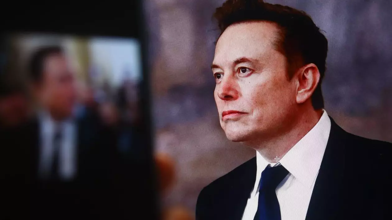 Fondatorul Tesla, SpaceX, Elon Musk imprăcat la costum cu o cămașă albă și cravată neagră