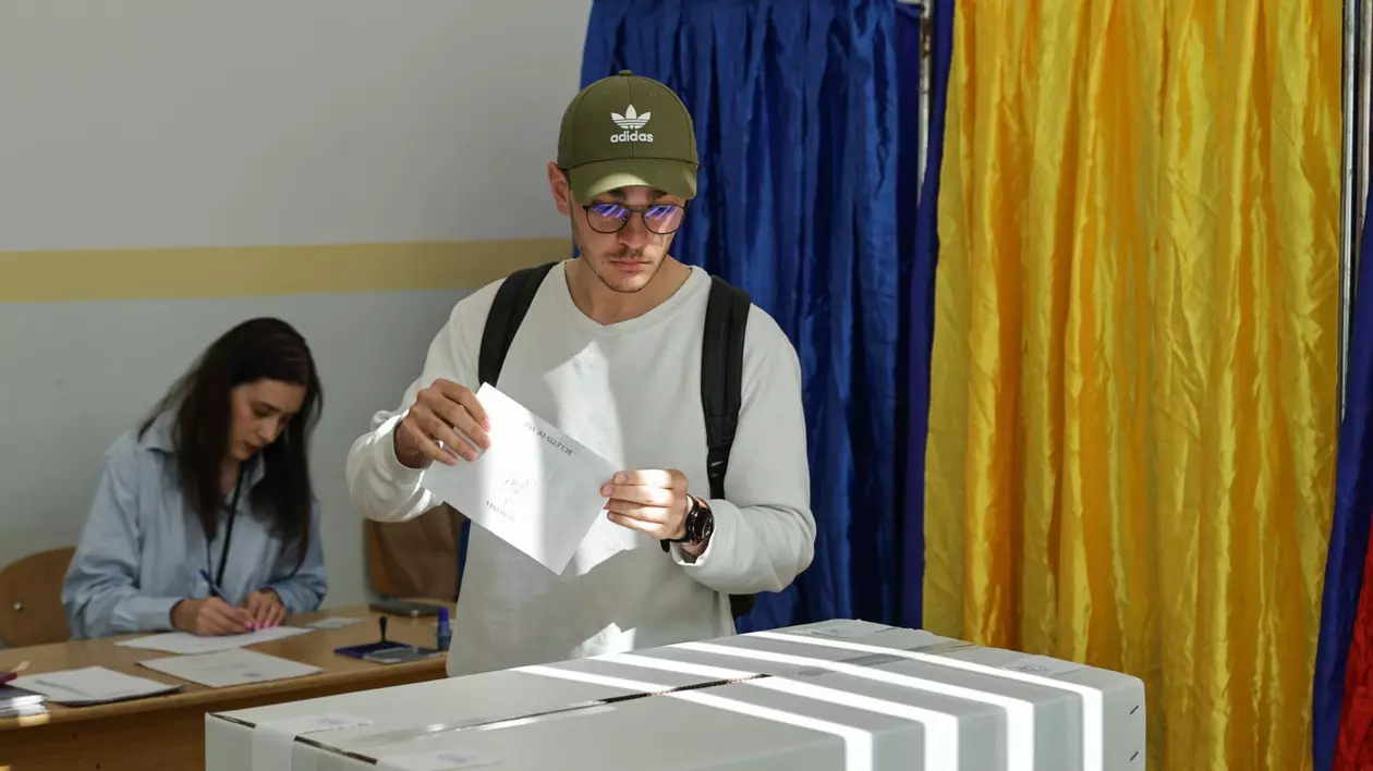 Alegător care votează la alegerile prezidențiale 2025