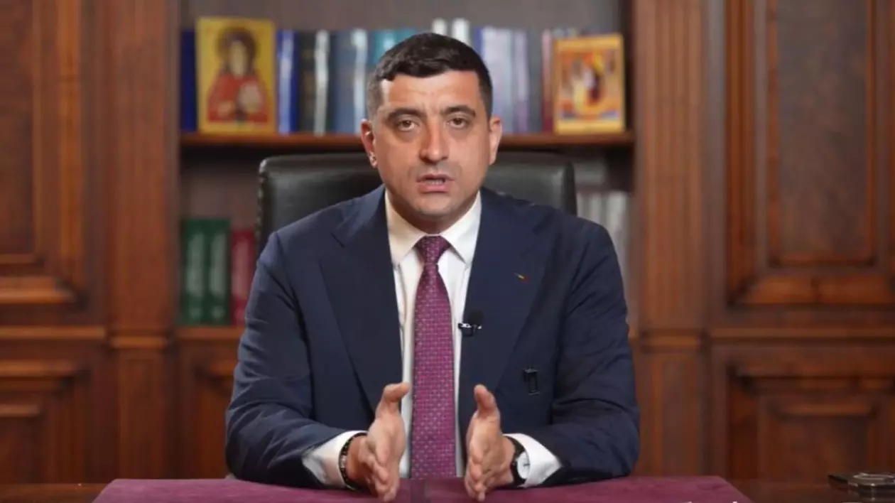George Simion în costum negru, cravată mov si comață albă, tine un discurs în biroul său, cu o bibliotecă cu carti si icoane in spate, dupa exit-poll