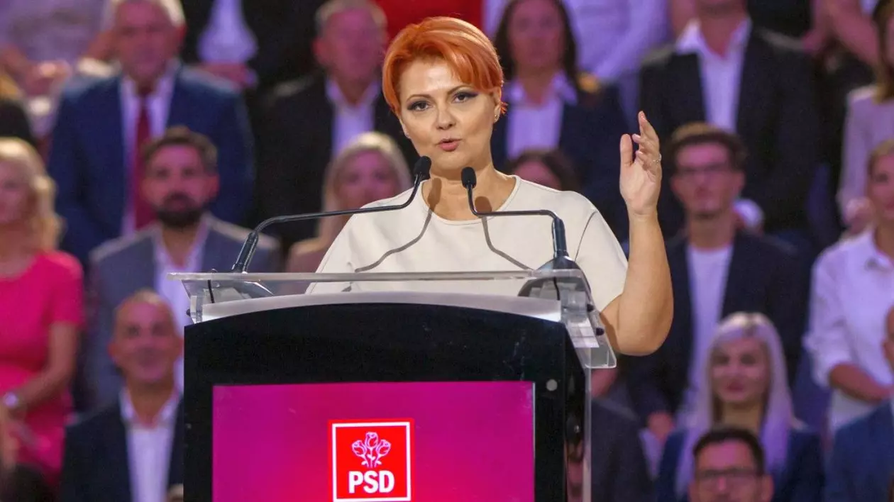 Lia Olguța Vasilescu vorbește la microfon de la pupitru