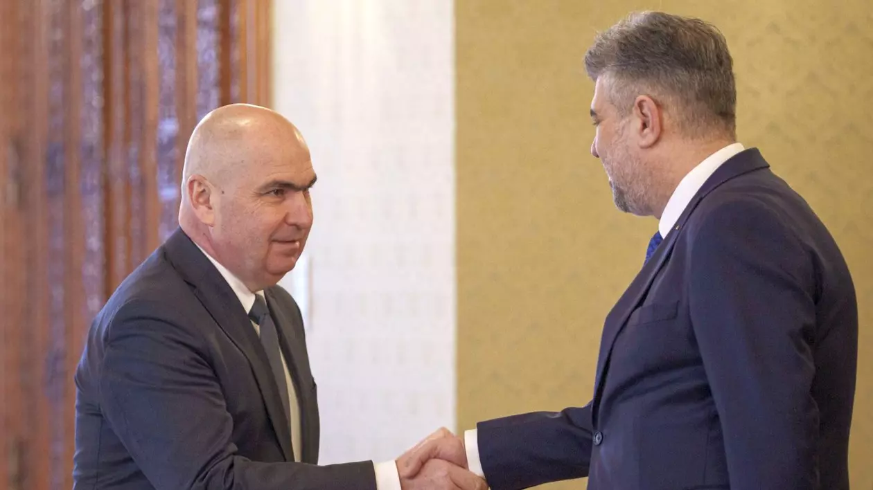 Marcel Ciolacu da mana cu presedintele interimar Ilie Bolojan. Ciolacu a renuntat la functia de premier dupa doi ani