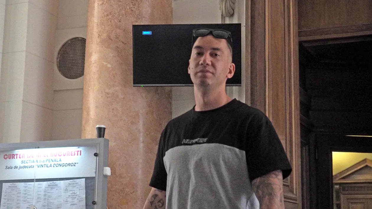 Michael Matthews Murray, surprins la ieșire din sala de judecată