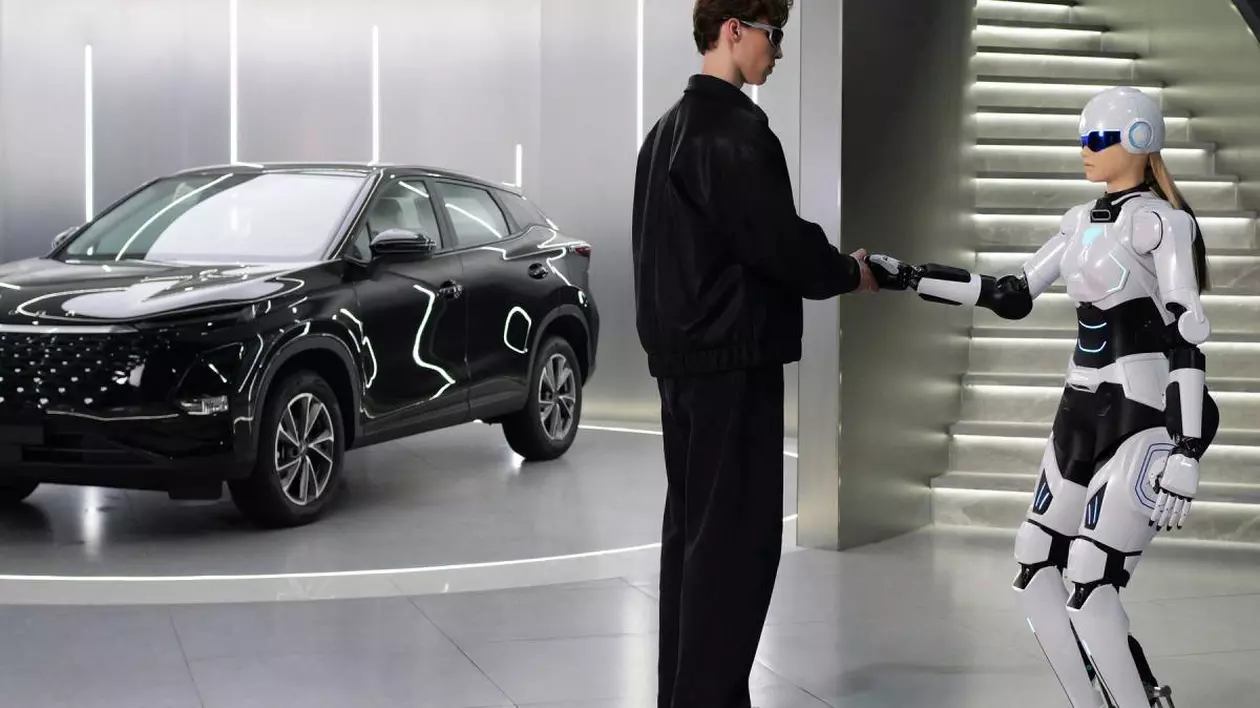 Bărbat îmbrăcat în negru, purtând ochelari de soare, dă mâna cu un robot umanoid avansat. În stânga imaginii se află un SUV negru expus.