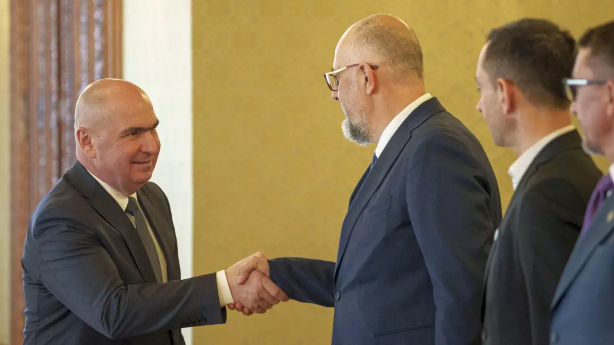 Ilie Bolojan (președinte interimar PNL) și Kelemen Hunor (președinte UDMR)