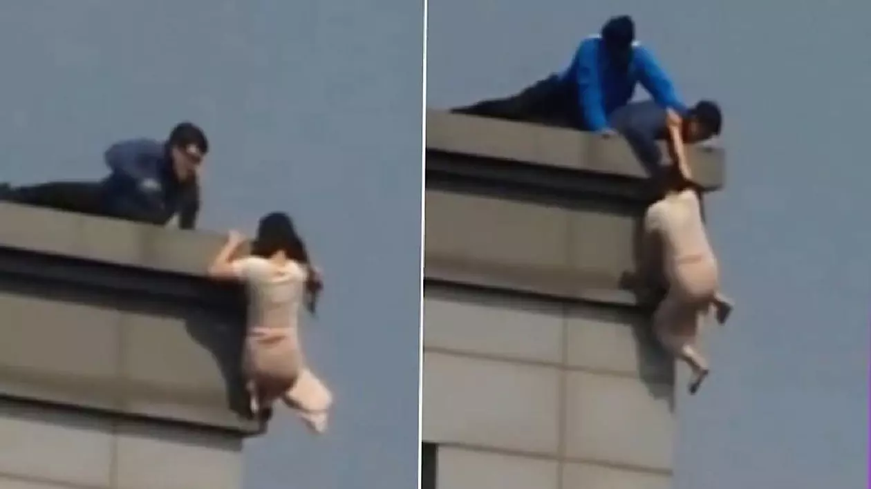 O femeie care a vrut să se arunce de pe un zgârie-nori din Seul a fost salvată de pompieri după 2 ore | VIDEO