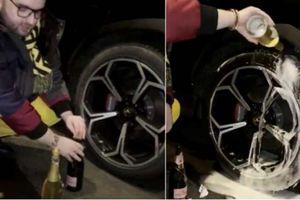 Reacția jurnaliștilor francezi la imagini în care Victor Micula își spală roțile Lamborghini cu șampanie scumpă.  VIDEO