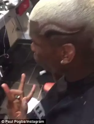 3638C9F500000578-3687831-Pogba_holds_up_a_hand_sign_as_the_camera_pans_around_his_head_to-m-33_1468396629049