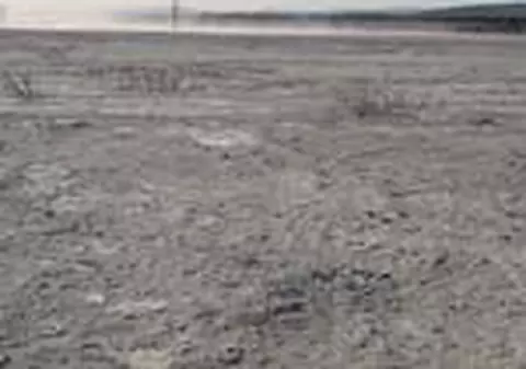 Asezari inghitite de praf toxic