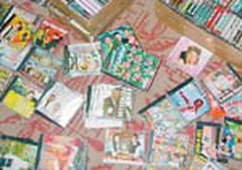 Peste de CD-uri piratate, descoperite de politisti in Capitala