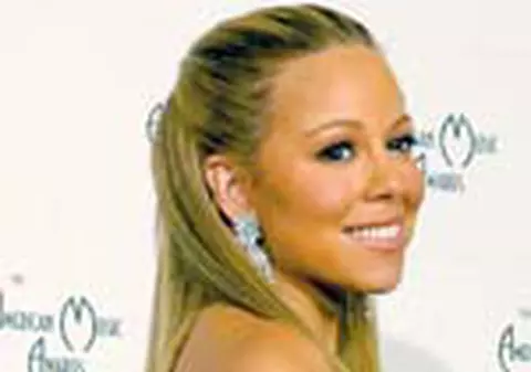 Mariah Carey merge la baie cu bodyguarzi