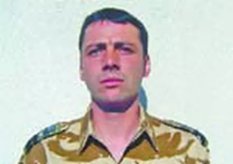 Inca un militar roman cazut la datorie