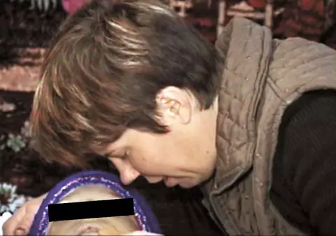 Şi-a sufocat copilul cu o pernă