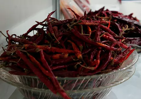 Român cu ”stomac de fier”, campion la ardei iuţi