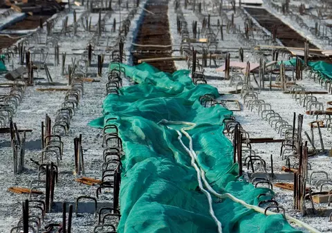 Românii din Italia se întorc în ţară din cauza crizei din construcţii
