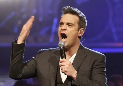 Robbie Williams s-a întors oficial în Take That 