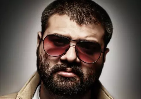 Grasul XXL: "Dacă l-aş întâlni pe Dumnezeu, i-aş spune că este un bulangiu"