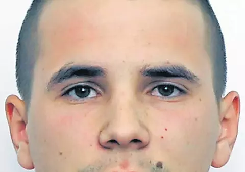 A vrut să ucidă un poliţist în WC-ul unui bar