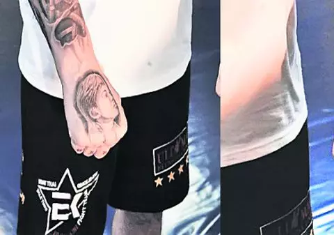 Cătălin Zmărăndescu şi-a tatuat chipul copiilor pe pumni