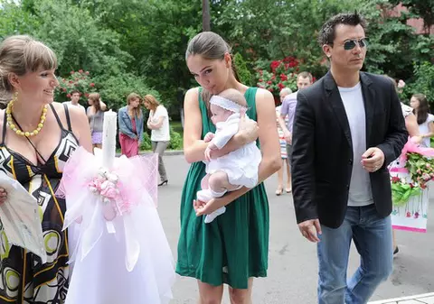 Foto | Răzvan Fodor şi Irina şi-au creştinat fetiţa