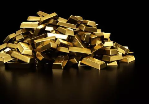 Uncia de aur atinge un nou record, iar bursele europene revin pe scădere