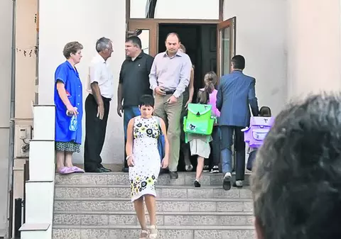 Truică fuge cu gemenele de nevastă