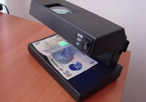 Falsificatori de bani, arestați la Constanța