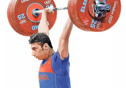 A luat banii, nu casa! Halterofilul Răzvan Martin a fost premiat pentru bronzul câştigat la Olimpiada de la Londra! VEZI CÂT A ÎNCASAT!