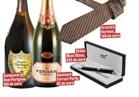 Şefii Băncii Naţionale beau spumante de lux