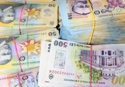 VESTE BUNĂ PENTRU BUGETARI: ar putea primi două salarii brute pe an, ca premiu de excelenţă