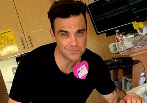 Show în sala de naşteri! Robbie Williams şi-a întâmpinat fiul dansând şi cântând