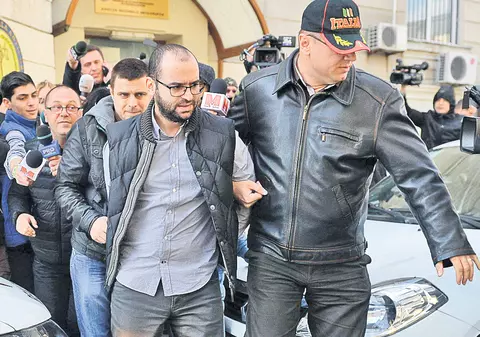 Şeful ANI, încătuşat ca un interlop