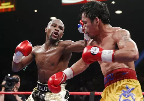 MAYWEATHER l-a bătut la puncte pe PACQUIAO. Lupta a dezamăgit! / FOTO