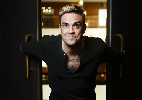 Fiţe de vedetă! Ce le-a cerut Robbie Williams organizatorilor concertului din România. Va avea 280 de prosoape şi 48 de ouă